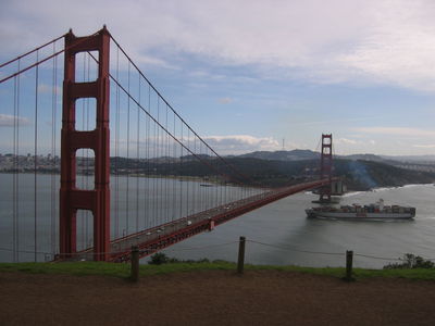 Ship passes under the Golden Gate Bridge
