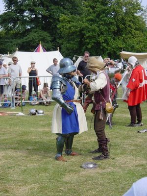 Members of the Medieval Siege Society prepare for battle
