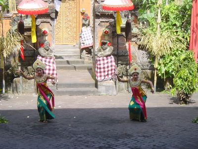 Two dancers perform the Legong dance
