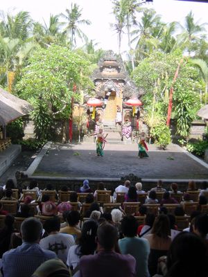 The dance theatre at Batubulan
The dance took place in a dedicated theatre. As far as I can tell this was a traditional Balinese theatre, with the split gate at the back of the stage, in front of a temple-like structure. The audience sits in tiered rows.
