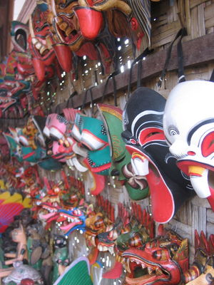Masks at the wood-carving shop, Ubud Market
