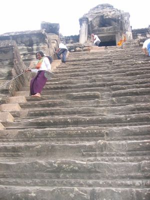 View up the steps to central tower of Angkor Wat
