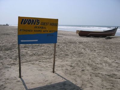 Sign for Ivon's on the beach
