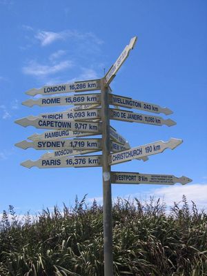 Signpost at Tauranga Bay, Cape Foulwind
